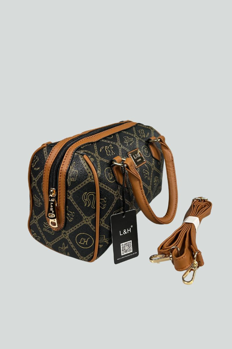 Μαύρη τσάντα τύπου νεσεσέρ με καφέ λεπτομέρειες και αποσπώμενο λουράκι