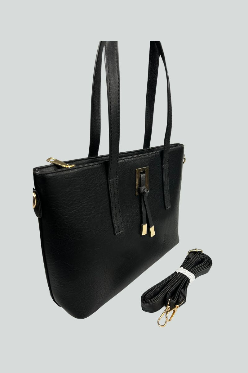 Μαύρη τσάντα με χρυσές λεπτομέρειες